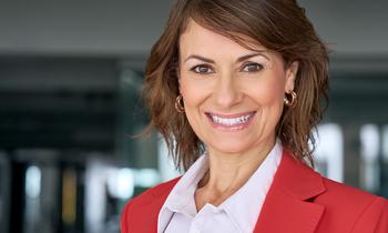 Porträt einer Frau, symbolisch für das MBA Finance Fernstudium der Hochschule Burgenland.